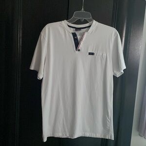 White men's T-shirt from Europe..it says xxl but fits M. I gave the dimensions